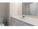 Bathroom with a light countertop and vanity providing a functional and refreshing space at 679 Gold Valley Pass, Canton, GA 30114