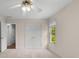 A bedroom featuring carpet flooring, a large closet, and a window with natural light at 679 Gold Valley Pass, Canton, GA 30114