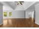 Spacious main bedroom with hardwood flooring, natural light, and trey ceiling design at 679 Gold Valley Pass, Canton, GA 30114