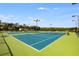 Multiple lighted tennis courts for evening games and lessons, offering a great amenity for tennis enthusiasts at 679 Gold Valley Pass, Canton, GA 30114