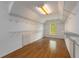 Spacious walk-in closet with ample shelving and hardwood flooring at 679 Gold Valley Pass, Canton, GA 30114