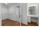 Walk-in closet leads to an additional area with a built-in vanity at 679 Gold Valley Pass, Canton, GA 30114