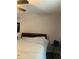 Primary bedroom featuring a dark wood headboard at 985 Romer Pl, Stone Mountain, GA 30083