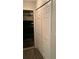 Hallway with closet and view to garage at 985 Romer Pl, Stone Mountain, GA 30083