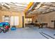 Unfinished basement space with a pool table offers potential for customization and recreation at 1114 Ivey Chase Pl, Dacula, GA 30019