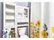 Bathroom features storage space and sunflower shower curtain at 1114 Ivey Chase Pl, Dacula, GA 30019
