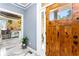 Bright entryway with marble floors, elegant console table, and a view into the adjacent room at 1114 Ivey Chase Pl, Dacula, GA 30019