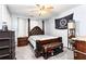 Well appointed main bedroom with a decorative four-poster bed frame at 1114 Ivey Chase Pl, Dacula, GA 30019