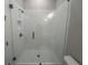 Bathroom features a glass enclosed shower with modern tile surround at 128 Bert Lane Se # 167, Atlanta, GA 30316