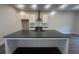 New kitchen boasts an island, modern appliances, and stylish pendant lighting at 128 Bert Lane Se # 167, Atlanta, GA 30316