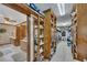 Walk-in closet featuring open shelving, custom cabinets, and ample storage space at 1724 Arbor Hill Rd, Canton, GA 30115