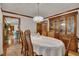 Dining room view showcasing china cabinet and table set for elegant dining at 1724 Arbor Hill Rd, Canton, GA 30115