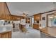 Bright kitchen features a central island with seating and plentiful wood cabinetry at 1724 Arbor Hill Rd, Canton, GA 30115