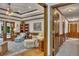 Cozy living room features beautiful hardwood floors, detailed trim work, and natural light at 1724 Arbor Hill Rd, Canton, GA 30115