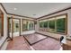 Versatile room with desk, hot tub, and a window showcasing the wooded outdoor area at 1724 Arbor Hill Rd, Canton, GA 30115