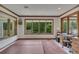Versatile room with desk, hot tub, and a window showcasing the wooded outdoor area at 1724 Arbor Hill Rd, Canton, GA 30115
