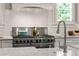 Close-up of a gourmet kitchen featuring stainless steel appliances and modern finishes at 23 Long Island Pl, Sandy Springs, GA 30328