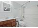 Bathroom with a sink and a bathtub with shower head at 2297 Ironwood Hill Ct, Dacula, GA 30019