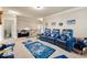 Bonus room featuring leather recliners, sports themed decorations and carpet flooring at 3755 Lake Haven Way, Atlanta, GA 30349