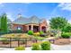 Community clubhouse with beautifully landscaped grounds and manicured shrubbery at 3755 Lake Haven Way, Atlanta, GA 30349