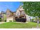 Attractive two-story home with brick and stone details, neat landscaping, and a two-car garage at 3755 Lake Haven Way, Atlanta, GA 30349