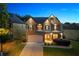 Well-maintained two-story home with stone accents and a manicured front yard at 3755 Lake Haven Way, Atlanta, GA 30349
