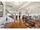 Elegant foyer with hardwood floors, classic trim, and staircase leading upstairs at 3755 Lake Haven Way, Atlanta, GA 30349