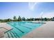 Resort-style swimming pool with slide and lap lanes surrounded by lush landscaping on a sunny day at 3755 Lake Haven Way, Atlanta, GA 30349