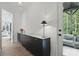 Elegant entryway featuring a modern console table and access to a relaxing outdoor seating area at 572 Cresentry Brk, Smyrna, GA 30082