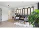 Stylish sitting room with a bookshelf and cozy chairs; perfect for relaxation and conversation at 572 Cresentry Brk, Smyrna, GA 30082