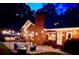 Charming backyard with ambient string lights, creating a relaxing atmosphere for evening gatherings by the fire pit at 8032 Banks Mill Rd, Douglasville, GA 30135