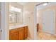 Clean bathroom with a vanity, and easy access to other rooms at 8032 Banks Mill Rd, Douglasville, GA 30135