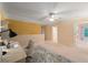 Versatile loft space with a desk, neutral colors, and a view to other rooms in the home at 8032 Banks Mill Rd, Douglasville, GA 30135