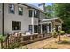 Inviting outdoor deck with cozy seating and garden views, ideal for relaxation and entertaining at 2180 Dunwoody Heritage Dr, Atlanta, GA 30350