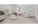 Charming Bedroom featuring an animal mural, a teepee, a crib, and open shelving for books and toys at 2180 Dunwoody Heritage Dr, Atlanta, GA 30350