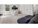 Bright bedroom with a workstation, dual monitors, a cozy beanbag chair, and a comfortable couch at 2180 Dunwoody Heritage Dr, Atlanta, GA 30350