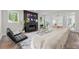 Modern living room with fireplace and neutral furniture at 2180 Dunwoody Heritage Dr, Atlanta, GA 30350