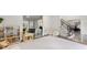 Bright and airy playroom with easy access to living area and staircase at 2180 Dunwoody Heritage Dr, Atlanta, GA 30350