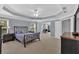 Bright bedroom with tray ceiling and large windows, with access to a connected office area at 221 Hampton Station Blvd, Canton, GA 30115