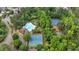 Aerial view of the community amenities, featuring tennis courts and a sparkling swimming pool at 221 Hampton Station Blvd, Canton, GA 30115