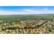 Aerial view of the neighborhood, showcasing tree-lined streets, well-maintained homes, and lush surroundings at 221 Hampton Station Blvd, Canton, GA 30115