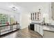 Eat-in kitchen with updated appliances, wood floors and plenty of natural light at 2410 Bankstone Sw Dr, Marietta, GA 30064