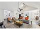 Open-concept living room with comfortable seating and lots of natural light at 2410 Bankstone Sw Dr, Marietta, GA 30064