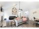 Bright living room with a fireplace, ceiling fan and modern decor at 2410 Bankstone Sw Dr, Marietta, GA 30064