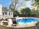 Backyard with a refreshing private pool and deck area perfect for entertaining at 2410 Bankstone Sw Dr, Marietta, GA 30064