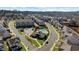 Overhead view of a neighborhood featuring well-maintained streets and community pool and clubhouse at 3239 Bartee Walk, Suwanee, GA 30024