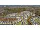 An aerial view of a Primary-planned community featuring perfectly manicured lawns, sidewalks, and attractive home exteriors at 3239 Bartee Walk, Suwanee, GA 30024