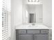 Bathroom vanity with shaker cabinets, white quartz countertop, and large mirror at 3239 Bartee Walk, Suwanee, GA 30024