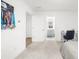 Bedroom with carpet, desk, and view into the bathroom at 3239 Bartee Walk, Suwanee, GA 30024