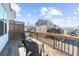 Spacious wooden deck with railing, offering an outdoor space for relaxing and enjoying the neighborhood view at 3239 Bartee Walk, Suwanee, GA 30024